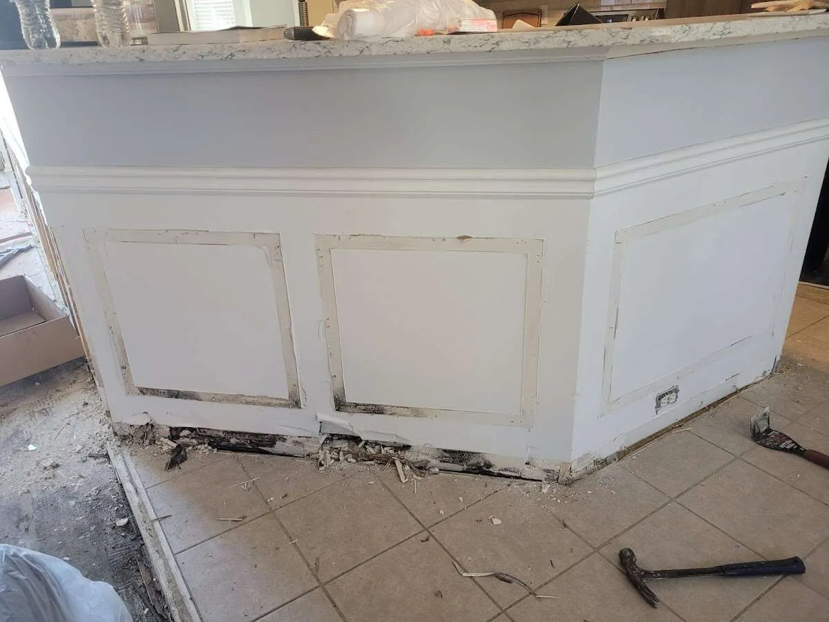 Water damage and mold on kitchen during Storm Damage Restoration in Jamestown